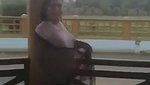 Desi Bhabhi in REsort Dancing in Rain showing her boobs