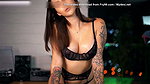 Her face is charming, full of sensuality and mischief