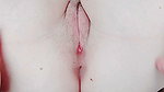 Her pussy is a complete strawberry, pink on the outside and inside when you open her labia majora