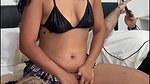 Latina masturbates her pussy in lingerie wearing a sexy and short skirt