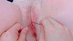 My tight cunt spread open with metal clips