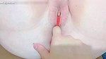 opening her pussy with a jar to collect her fluids