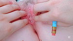 penetrating her closed pussy with a pen she moans with pleasure