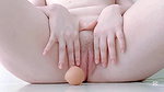 puts an egg inside her tight pussy lips