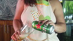 Hot Latina girl masturbates in the kitchen to soothe the heat of her wet pussy