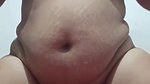 A young beauty with a big ass masturbates her pussy with a jar of cream
