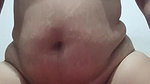 A young beauty with a big ass masturbates her pussy with a jar of cream