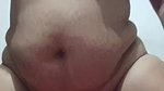 A young beauty with a big ass masturbates her pussy with a jar of cream