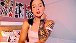 Sexy skinny Colombian with a tattooed body seduces you from her bed with her beautiful figure and her good-girl face
