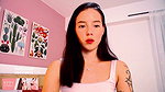 Sexy young Colombian girl loves showing off and modeling her beautiful slim and tattooed body