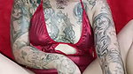 Stepmom in red dress and heels fucks her husband’s cousin