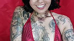 Stepmom in red dress and heels fucks her husband’s cousin