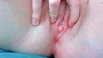 stretching her pussy lips until her shell opens