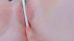 stretching the pink lips attached to her pussy