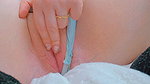 the bathrooms of her school opening her pussy under her skirt