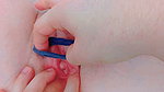 tying her petite pussy, squeezing it shut