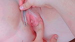 waxing her pink pussy leaving it smooth and soft