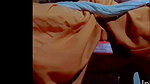 A single woman mastrebating with a lot of passion