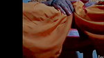 A single woman mastrebating with a lot of passion