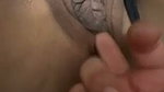 Fingering her huge pussy
