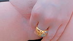 Her hooded clitoris becomes erect upon reaching orgasm