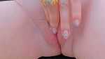 Her hooded clitoris becomes erect upon reaching orgasm