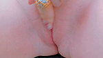 Her hooded clitoris becomes erect upon reaching orgasm