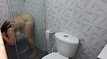 I record my stepmother masturbating in the bathroom