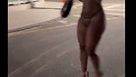 Walking at night flashing her ass 1