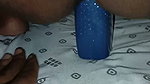 Inserting the bottle deep into the