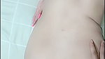Lying down she opens her tight ass