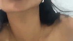 Adorable ebony chick rubs oil on her big tits 1