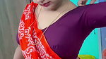 Homely housewife in saree adjusting blouse seducing show 1
