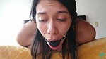 My first hogtied with duct tape and ball gag