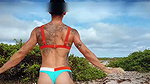 Push ups and chest flex on the beach