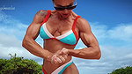 Push ups and chest flex on the beach