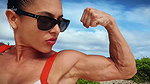 Push ups and chest flex on the beach