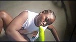 Ebony uses huge cucumber for squirting orgasm