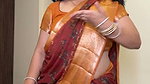 Punjabi curvy lady big deep navel in orange maroon saree  1