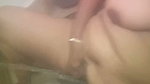 Masturbating