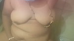 Masturbating