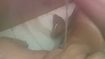 Masturbating