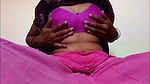 Ammu takes off her nightie and, left in just her undergarments, squeezes her breasts 129