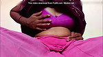 Ammu takes off her nightie and, left in just her undergarments, squeezes her breasts 129
