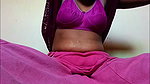 Ammu takes off her nightie and, left in just her undergarments, squeezes her breasts 129