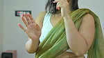 chubby desi lady with belly chain and navel in green saree 1