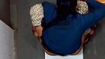 indian girl changing pad in toilet