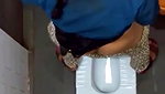 indian girl changing pad in toilet
