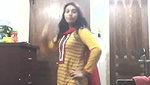 bengali girl in shalwar suit striping and trying dresses