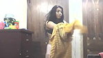 bengali girl in shalwar suit striping and trying dresses